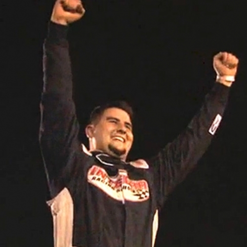 The Reaper celebrates after winnin the MARS DIRTcar Series feature at the Springfield Raceway in Springfield, Mo., on Saturday, May 11, 2013.